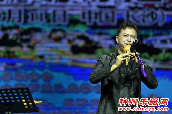 长沙音协葫芦丝巴乌学会举行周年庆典 李春华应邀献艺(组图)
