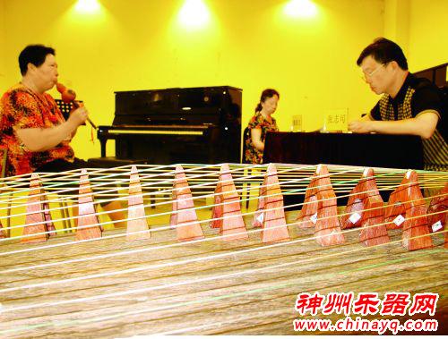 洛阳奶奶级学生喜获葫芦丝专业八级证书