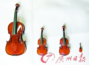 广州老琴师花七年时间造1厘米长小提琴