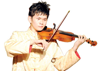 大马华裔精通东西方乐器曾为刘德华伴奏（组图）