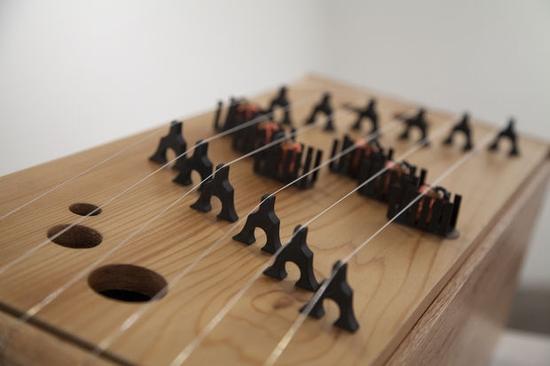 怎样做到不触碰乐器也能弹琴