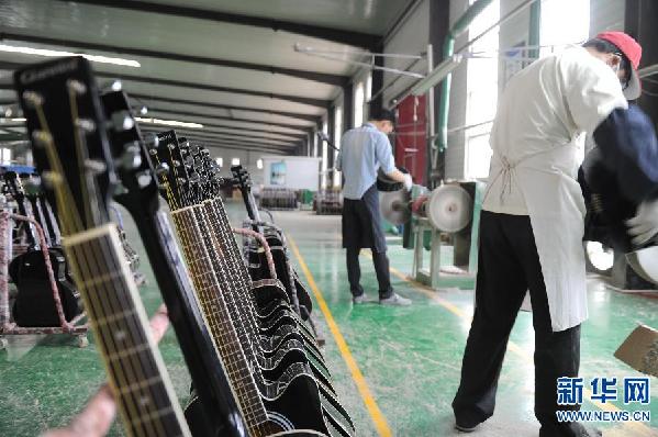 河北武强：国贫县隆起国际性西洋乐器产业带