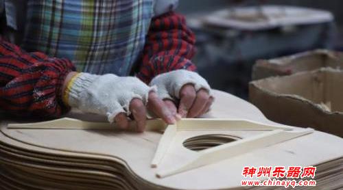 山乡蝶变 小小吉他做成跨国生意