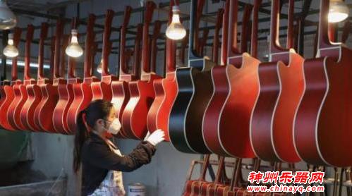 山乡蝶变 小小吉他做成跨国生意