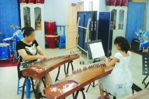 社区办免费古筝想学可联系本报