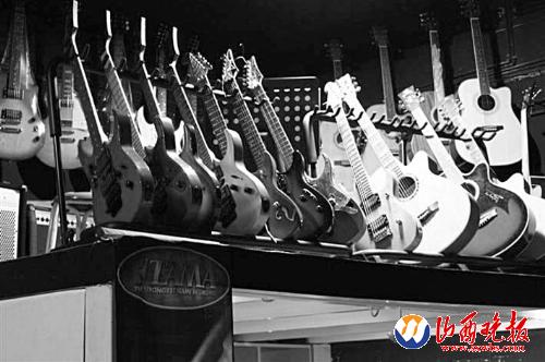 用吉他弹响心中的歌