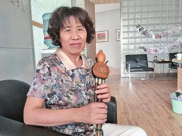“大器”晚成，58岁孙玉真葫芦丝奏响社区
